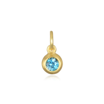 18 Karat Gold Bezel Set Blue Zircon Birthstone Charm