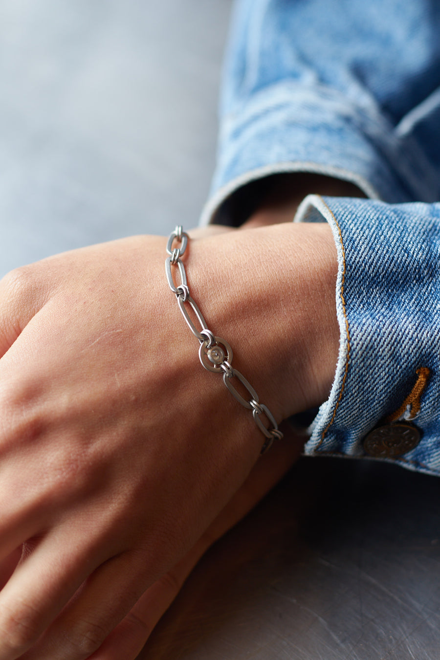 Platinum Paperclip Link Bracelet with Diamond Wheel