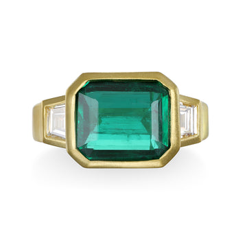 18 Karat Gold Emerald and Diamond Three Stone Ring