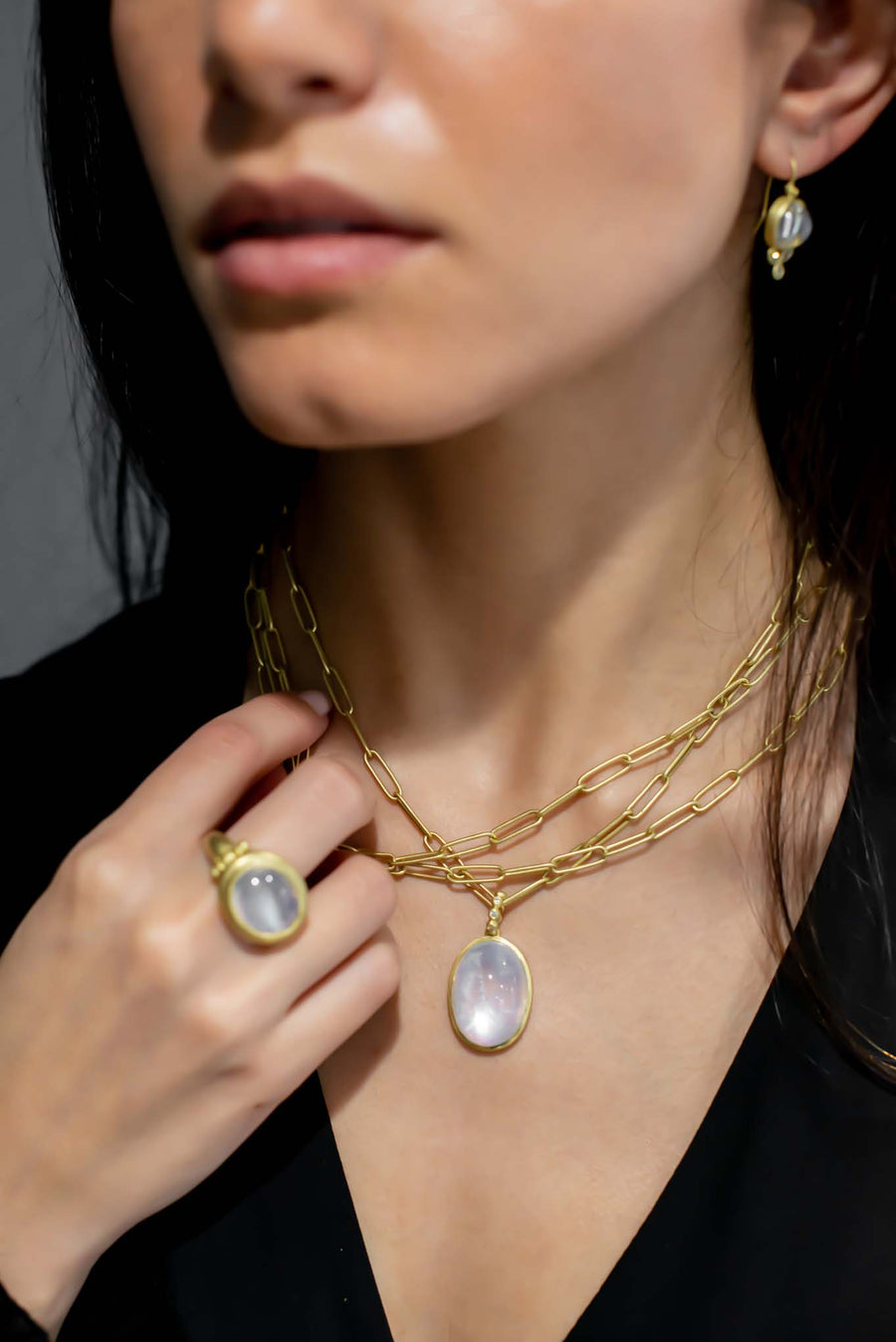Oval Rainbow Moonstone Pendant on Diamond Station Necklace