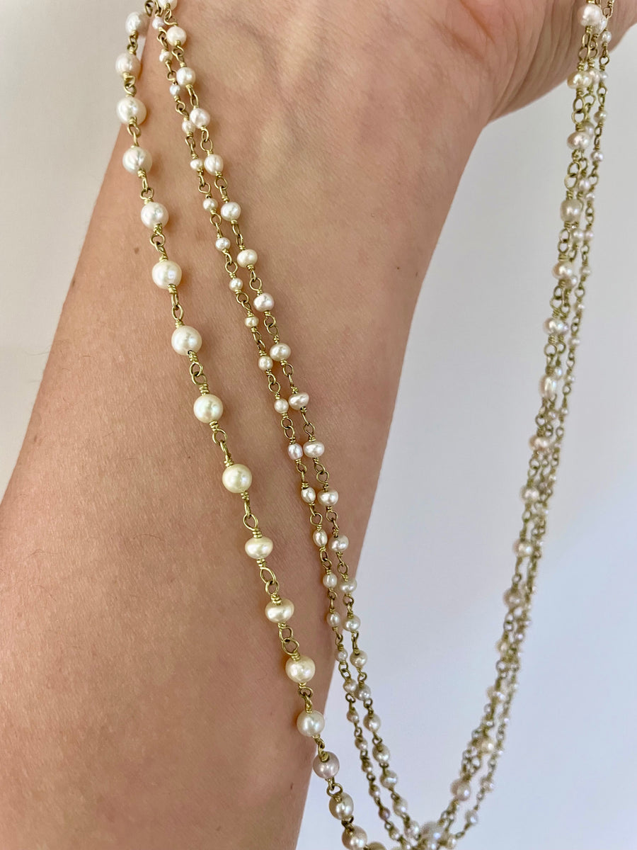 18 Karat Gold Natural Pearl Necklace