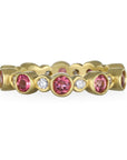 18 Karat Gold  Diamond and Pink Tourmaline Eternity Ring